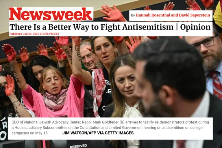NEWSWEEK CEO of National Jewish Advocacy Center, Rabbi Mark Goldfeder (R) arrrives to testify as demonstrators protest during a House Judiciary Subcommittee on the Constitution