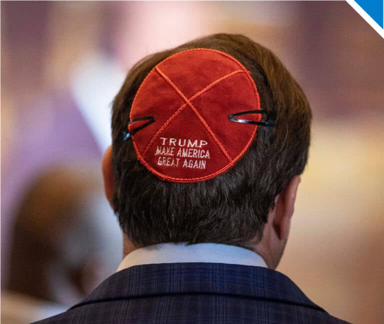 Man wearing red kippah with the slogan Make America Great Again - Photo by Sipa USA - Alamy Stock Photo