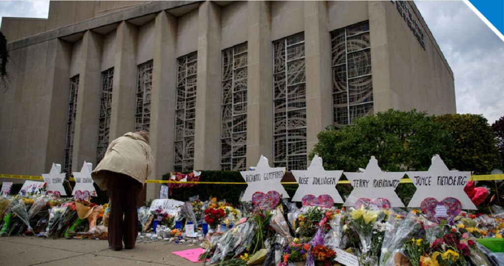 Mourners visited the memorial outside Tree of Life Synagogue - Photo by Jeff Swensen via Getty Images